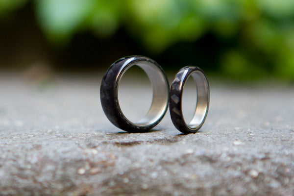 Set of two titanium and carbon fiber wedding bands. Unique black glossy rings. (00317) - Rosler Rings
