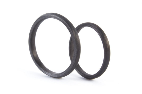 Set of two carbon fiber round wedding bands. Unique and modern black rings. (00145) - Rosler Rings